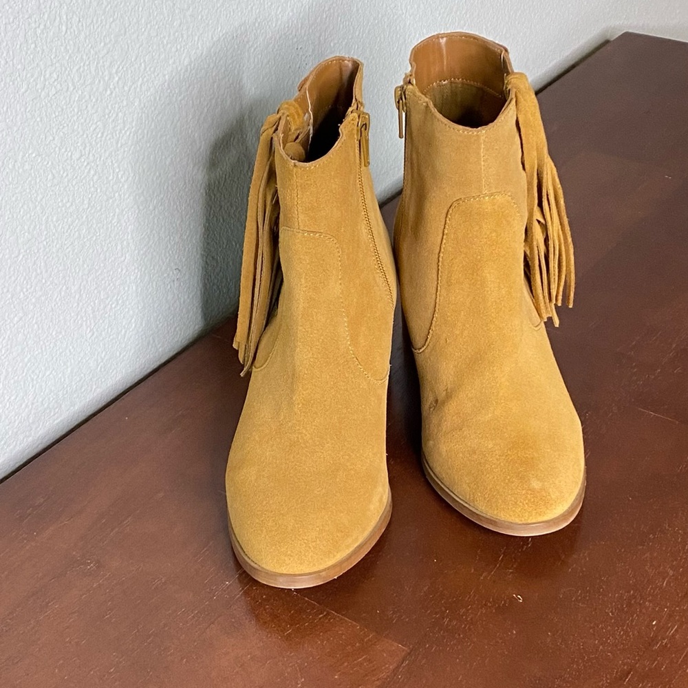 Western inspired fringe booties